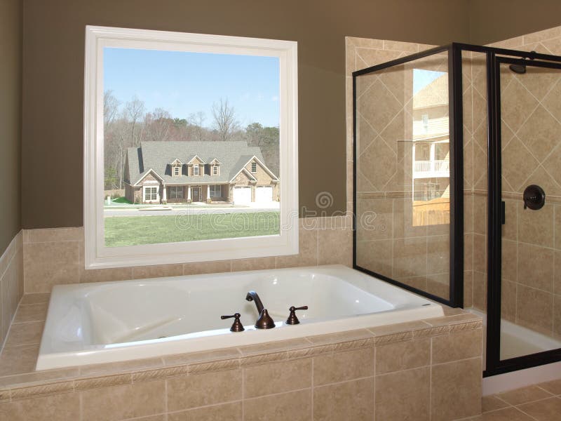 Luxury Bathroom Tub and Window 1 royalty free stock image