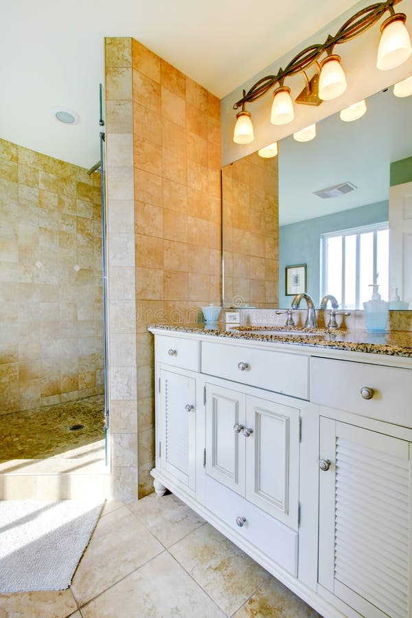 Luxury Bathroom with White Marble Counters, and Large Stock Photo Image of renovated