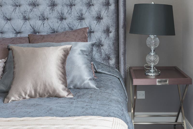 Luxury Bed with Pillows and Tray of Tea Set on Blanket Stock Image