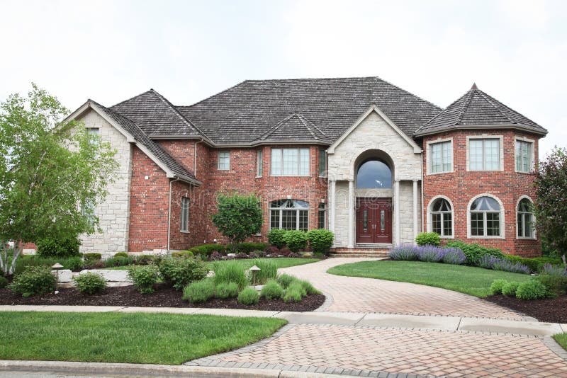 Luxury Brick Home with Front Balcony Stock Image - Image of expensive ...