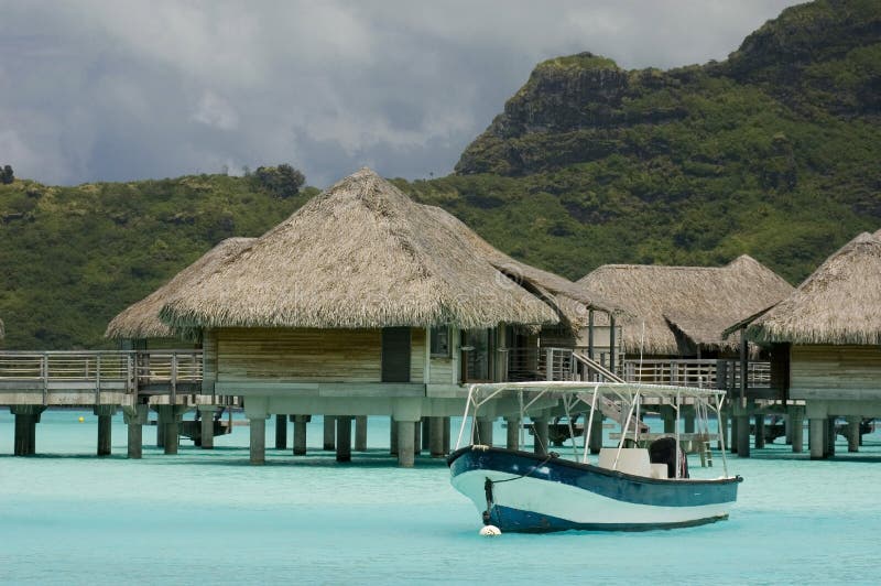 Luxury Thatched Roof Honeymoon Bungalows Stock Photo - Image of tahiti ...