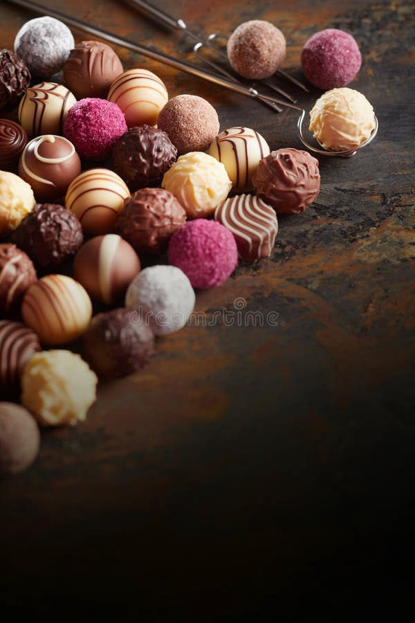 Luxury chocolate pralines in neat diagonal lines stock photo
