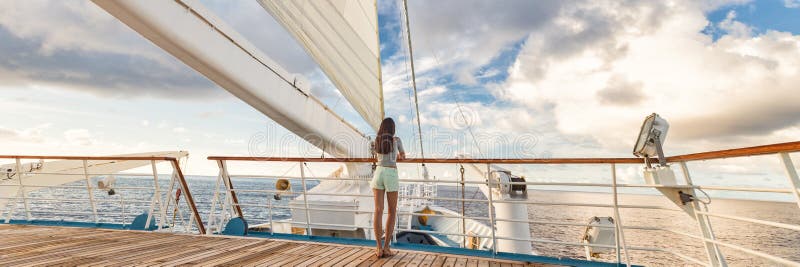 Luxury cruise ship vacation woman on deck banner panorama. Travel in Tahiti on sail boat, exotic destination. Tourism in