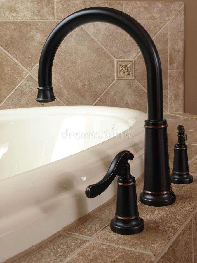 Luxury Curved Jacuzzi faucet stock photography