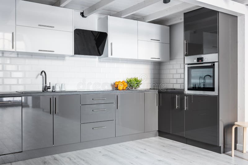Gray kitchen with brick wall royalty free stock photography Gray kitchen with brick wall royalty free stock photography