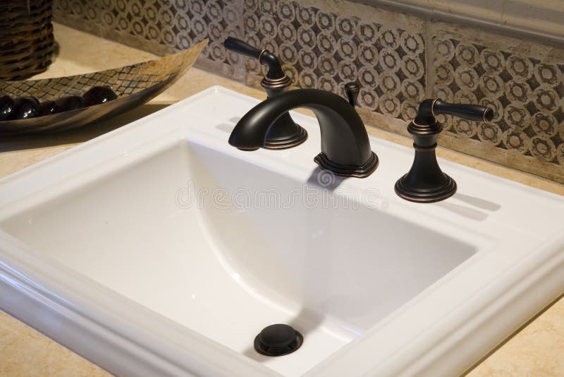 Luxury home bathroom sink. royalty free stock images