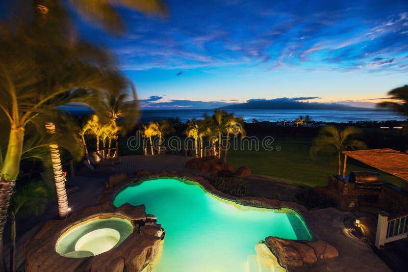 Luxury home with swimming pool stock images