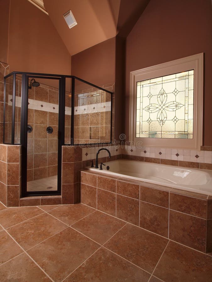 Luxury Home Tile Bathroom with window royalty free stock photo