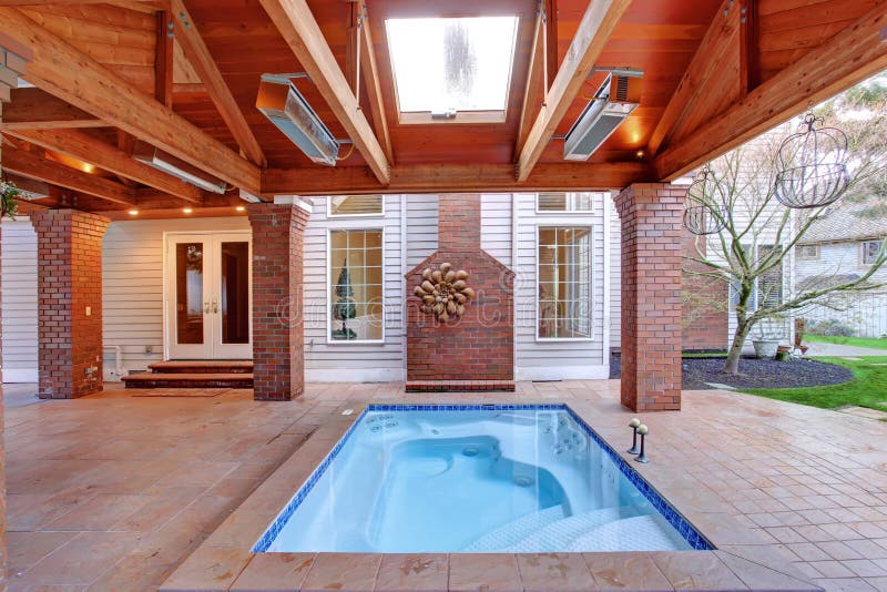 Luxury house with jacuzzi stock image. Image of spring 43175093