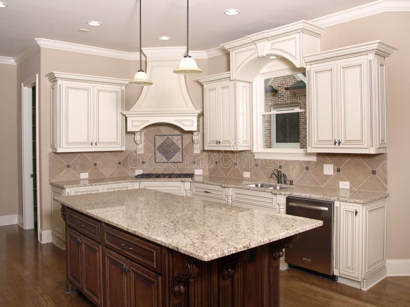 Luxury Kitchen with Granite Island and Window Stock Image - Image of
