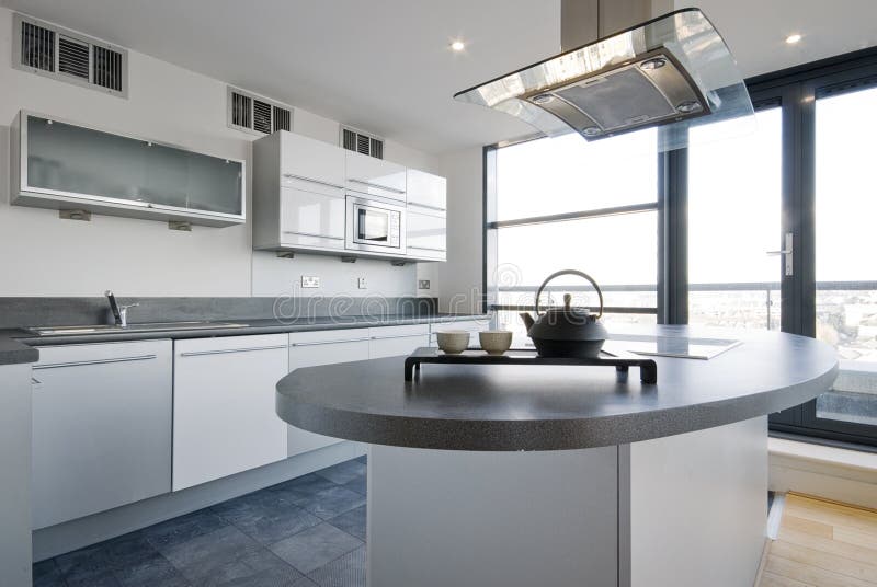 Luxury kitchen with separate work areas and modern appliances