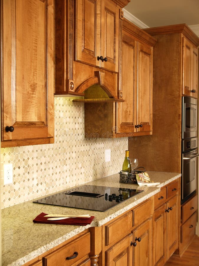 Luxury Model Home Honey Kitchen Cabinets Stock Photo - Image of ...