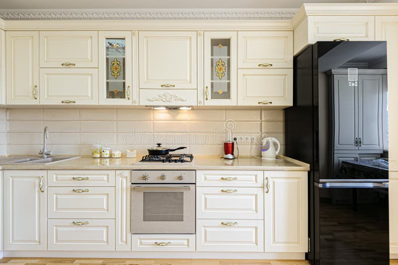 luxury-modern-beige-white-kitchen-laminated-floor-luxury-modern-beige-white-kitchen-interior-158170198.jpg