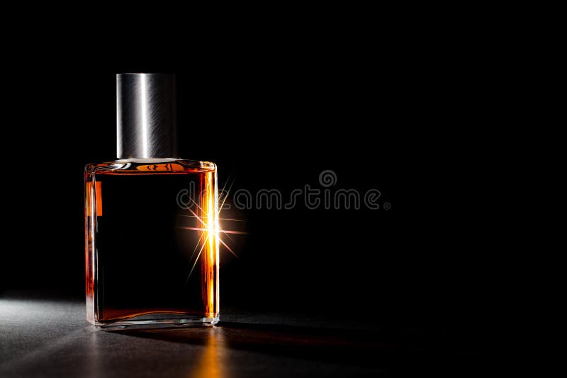 Luxury perfume bottle. Expensive fragrance in the spotlight.