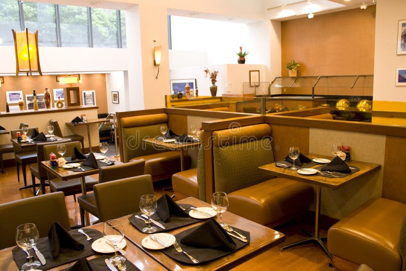 Restaurant with comfortable seats and beautiful lighting. Restaurant with comfortable seats and beautiful lighting.
