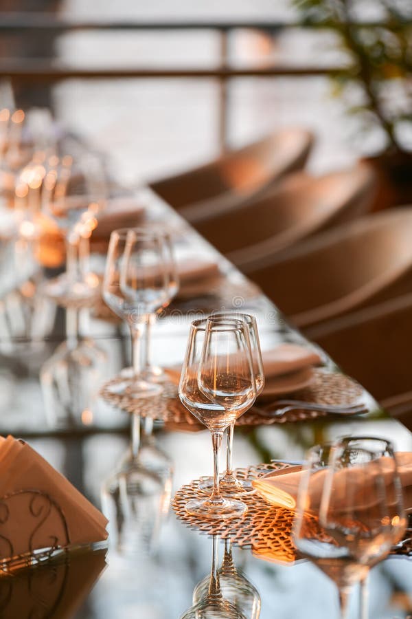 Luxury Restaurant Table Decorations. Glasses and Plates are Set Up on