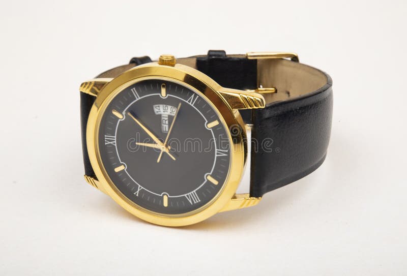 Luxury style golden hand watch close up view in white background