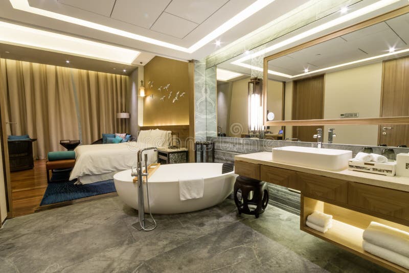 luxury suite 5 star bedroom and ensuite bathroom stock image - image