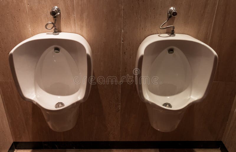 Urinal in a hotel stock photo. Image of restroom, bathroom 146118182