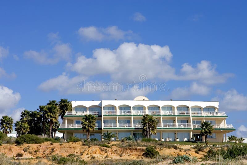 Luxury white Spanish hotel on the beach