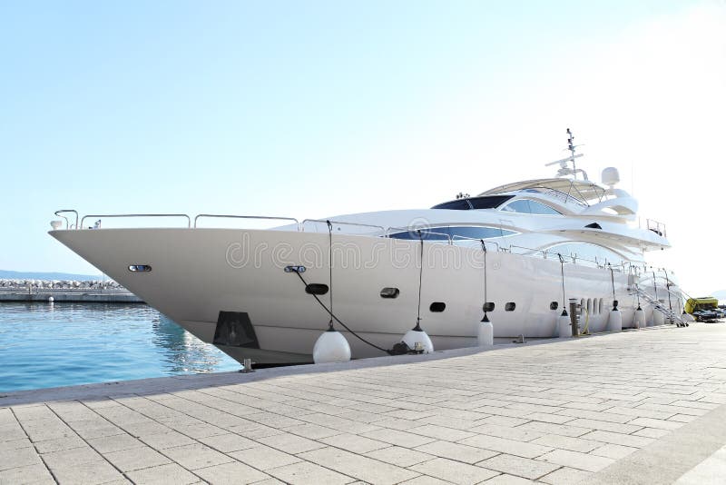 Luxury yacht parked at dock stock image Luxury yacht parked at dock stock image