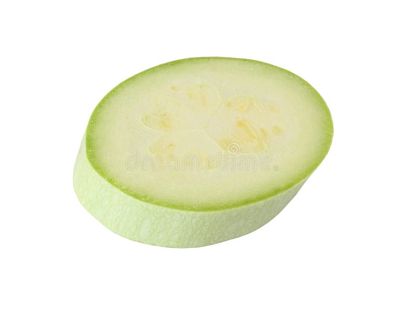 Luz do corte - abobrinha verde isolado no fundo branco imagem de stock royalty free