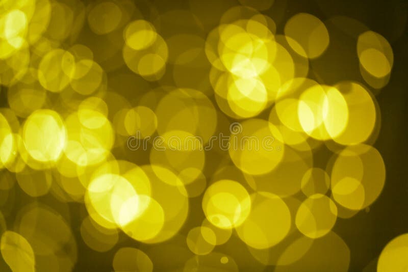Luzes de Natal abstratas do ouro amarelo como o fundo fotografia de stock royalty free Luzes de Natal abstratas do ouro amarelo como o fundo fotografia de stock royalty free
