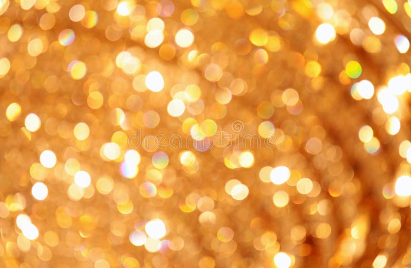 Luzes douradas abstratas Defocused fotografia de stock royalty free Luzes douradas abstratas Defocused fotografia de stock royalty free