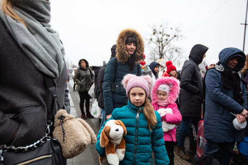 Ukrainian refugees on Lviv railway station waiting for train to escape to Europe. Lviv, Ukraine - March 7, 2022: Ukrainian refugees on Lviv railway station royalty free stock photo