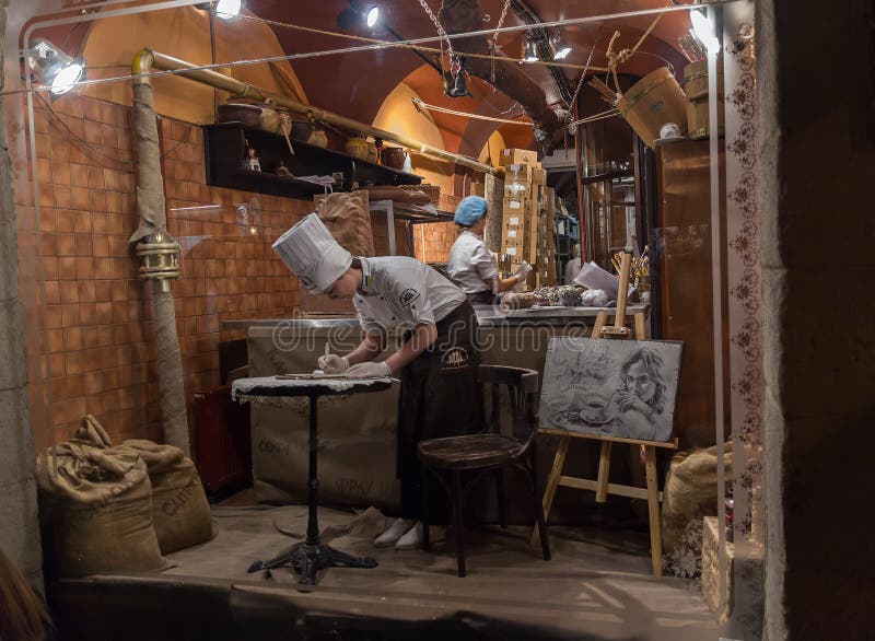 Lviv, Ukraine - October 18, 2015: Confectioners work for a showcase