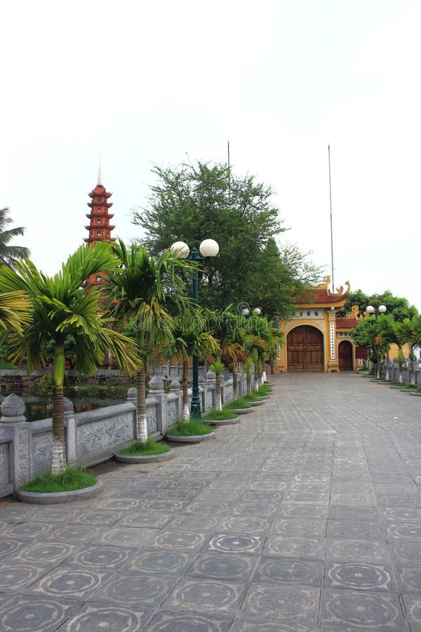 Ly Thai To Park � Ha NoiThe small park is a charming spot across the famous HoanKiem Lake at the heart of Hanoi. It is more than a park but also a memorial to the first king of the Ly dynasty who had moved his seat of power to Hanoi thus turning it from a small county to Vietnam�s powerful capital. Ly Thai To was born in 974. He joined the court later under the patronage of a powerful monk-Van Hanh. At the time, Buddhism was at its peak in Vietnam �society. Thus, the monk was a prominent power broker in the court. With the political capital and his innate charm, Ly Thai To quickly advanced up in his career ladder. He had been the first commoner to become the leading general of the capital. Ly was in charge of the siege of Hoa Lu- the then capital. In 1009, the King that Ly had served suddenly died while his popularity had been long gone due to his brutal killing. All of the legitimate heirs were too young to inherit the throne. Taking this opportunity, Ly collected the support from his allies which include the powerful monk-Van Hanh. Then, the whole court issued the consensus of Ly�s inheritance to the throne. The event was rather once in a blue moon. As it has been the first time that such power transition did not cost any blood or any arrows. In legend, Ly was taking a boat cruise in the river near Hanoi. There he saw a cloud in the shape of a flying dragon. Thus, he decided to move his seat to Hanoi naming it the capital of flying dragon. The legend must have been composed in the convenience of the king. Actually, he had had the plan to move all the time to avoid unnecessary nostalgia about the last dynasty. Furthermore, the old capital was surrounded by mountains providing a perfect defense to the central power during the lords� war. Ly had defeated them all. Thus he sought out for a well-connected hub of power and wealth. That was why Hanoi had been chosen. Nowadays, the statute of Ly stands tall casting a view on the eternal green of Ho Guom. The park becomes a spot for tourists to peek into Hanoians� life. Inheritance buddhism stock images, royalty-free photos and pictures