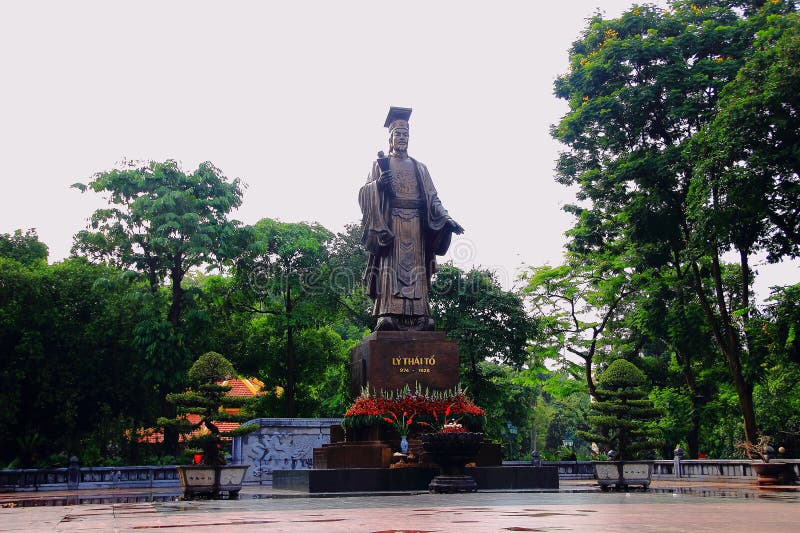 Ly Thai To Park � Ha NoiThe small park is a charming spot across the famous HoanKiem Lake at the heart of Hanoi. It is more than a park but also a memorial to the first king of the Ly dynasty who had moved his seat of power to Hanoi thus turning it from a small county to Vietnam�s powerful capital. Ly Thai To was born in 974. He joined the court later under the patronage of a powerful monk-Van Hanh. At the time, Buddhism was at its peak in Vietnam �society. Thus, the monk was a prominent power broker in the court. With the political capital and his innate charm, Ly Thai To quickly advanced up in his career ladder. He had been the first commoner to become the leading general of the capital. Ly was in charge of the siege of Hoa Lu- the then capital. In 1009, the King that Ly had served suddenly died while his popularity had been long gone due to his brutal killing. All of the legitimate heirs were too young to inherit the throne. Taking this opportunity, Ly collected the support from his allies which include the powerful monk-Van Hanh. Then, the whole court issued the consensus of Ly�s inheritance to the throne. The event was rather once in a blue moon. As it has been the first time that such power transition did not cost any blood or any arrows. In legend, Ly was taking a boat cruise in the river near Hanoi. There he saw a cloud in the shape of a flying dragon. Thus, he decided to move his seat to Hanoi naming it the capital of flying dragon. The legend must have been composed in the convenience of the king. Actually, he had had the plan to move all the time to avoid unnecessary nostalgia about the last dynasty. Furthermore, the old capital was surrounded by mountains providing a perfect defense to the central power during the lords� war. Ly had defeated them all. Thus he sought out for a well-connected hub of power and wealth. That was why Hanoi had been chosen. Nowadays, the statute of Ly stands tall casting a view on the eternal green of Ho Guom. The park becomes a spot for tourists to peek into Hanoians� life. Inheritance buddhism stock images, royalty-free photos and pictures