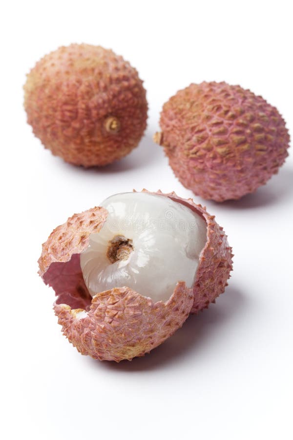 Lychees from which one has a broken skin