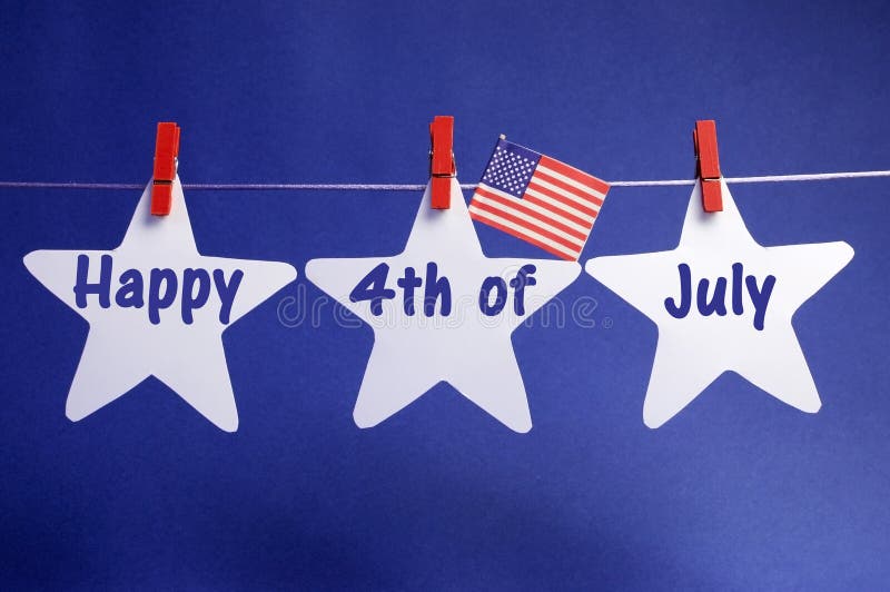 Happy Fourth 4th of July message written across three 3 white stars with USA American flag hanging on red pegs on a line against a blue background. Happy Fourth 4th of July message written across three 3 white stars with USA American flag hanging on red pegs on a line against a blue background.