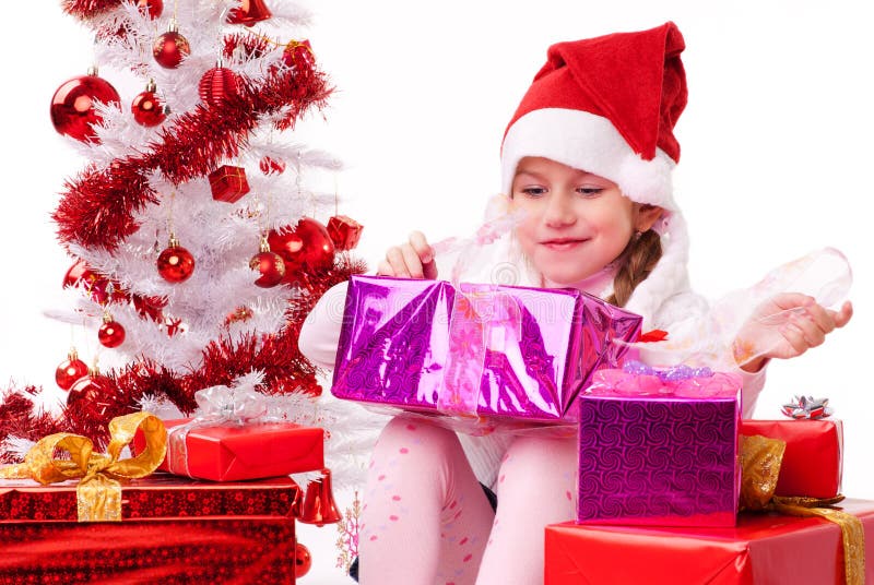 Lycklig liten flicka med många julklapp arkivbilder Lycklig liten flicka med många julklapp arkivbilder