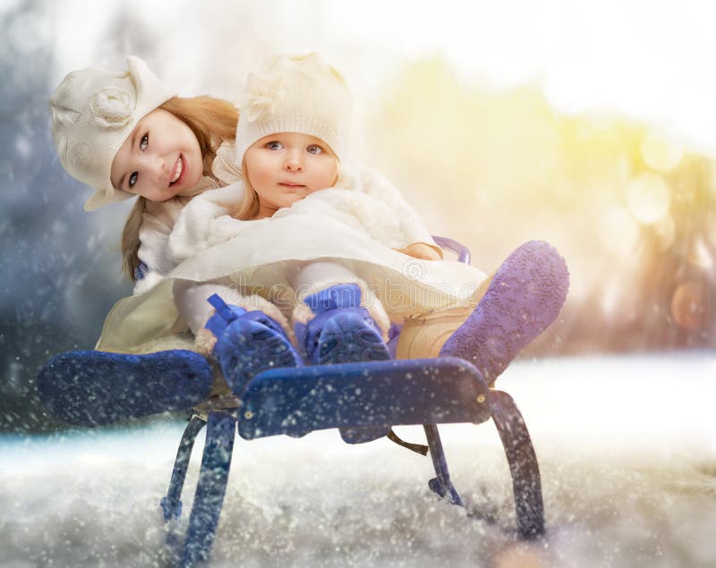 Two happy girls on sled. Two happy girls on sled