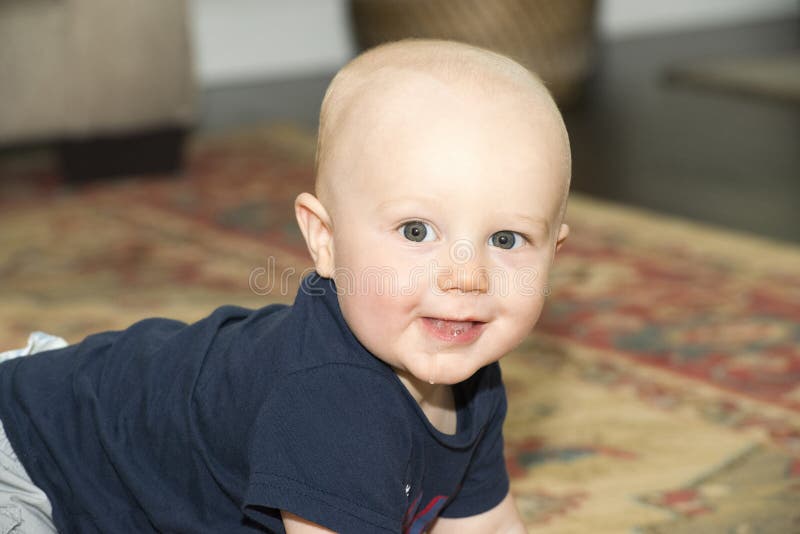 A Happy Teething Baby Boy smiles. A Happy Teething Baby Boy smiles