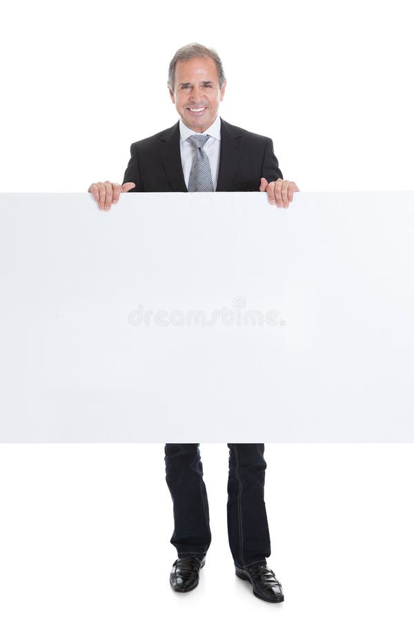 Lyckligt plakat för mellanrum för innehav för affärsman royaltyfri foto Lyckligt plakat för mellanrum för innehav för affärsman royaltyfri foto