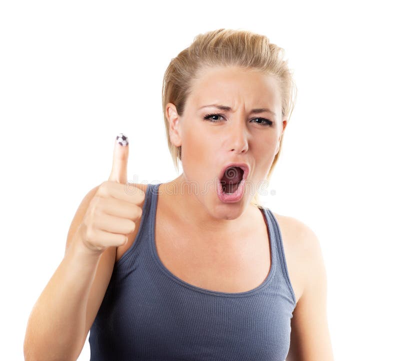 Happy football fan screaming, cute girl shouting Goal with thumbs up, expressing surprised emotions and joy, female watching ball competition, sport team supporter, young woman having fun. Happy football fan screaming, cute girl shouting Goal with thumbs up, expressing surprised emotions and joy, female watching ball competition, sport team supporter, young woman having fun