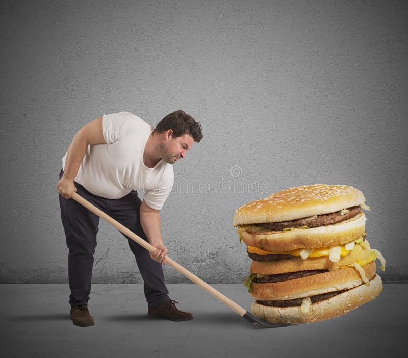 Man lifts with shovel a giant sandwich. Man lifts with shovel a giant sandwich