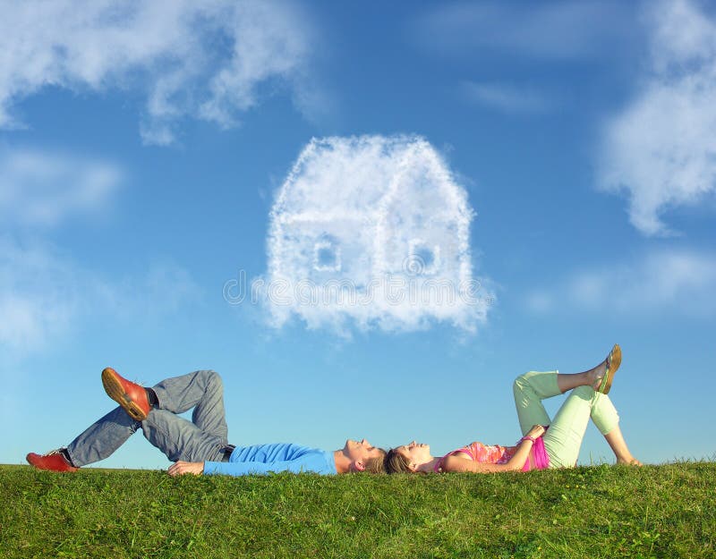 Lying couple on grass and dream house collage