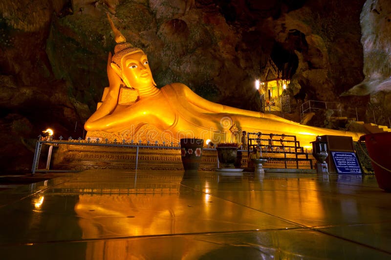 Lying gold Buddha in the temple of Thailand