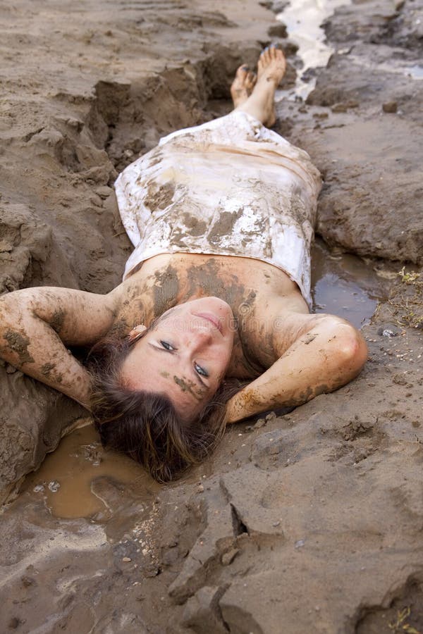 Lying in the mud