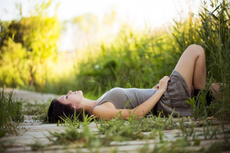 Lying on a walkway