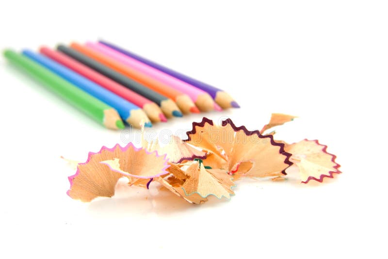 Colorful pencils and shavings isolated on white background. Colorful pencils and shavings isolated on white background