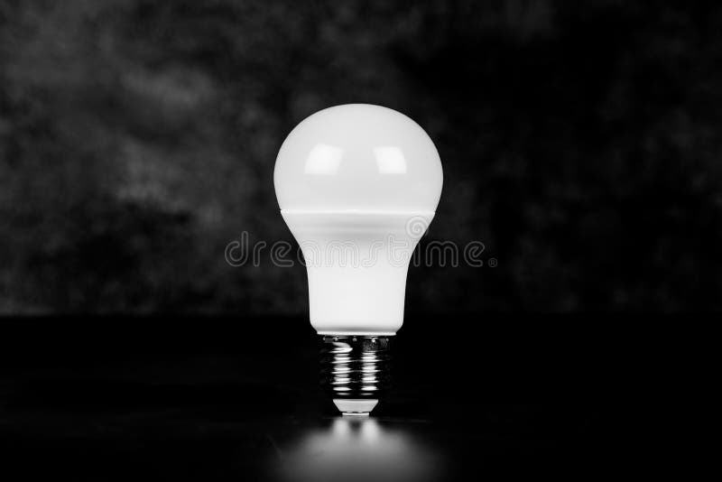 LED Bulb with Lighting on black background Eco power concept. LED Bulb with Lighting on black background Eco power concept.