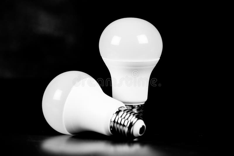 LED Bulb with Lighting on black background Eco power concept. LED Bulb with Lighting on black background Eco power concept.