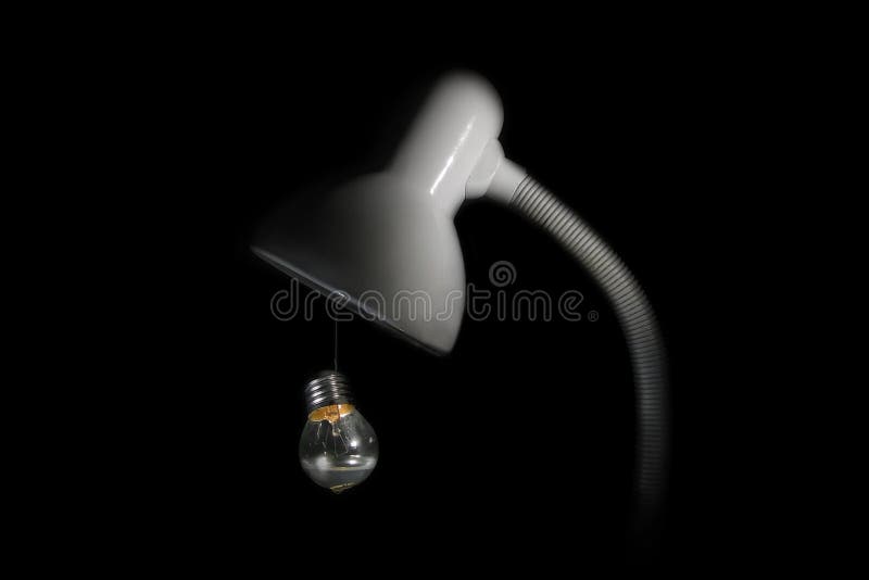 Lâmpada de mesa com bulbo de suspensão fotografia de stock royalty free Lâmpada de mesa com bulbo de suspensão fotografia de stock royalty free