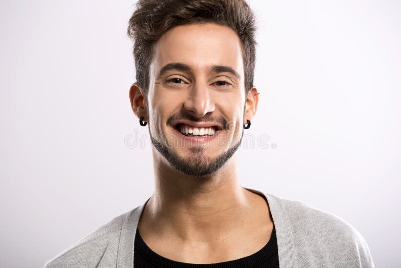 Lächeln des jungen Mannes stockbild