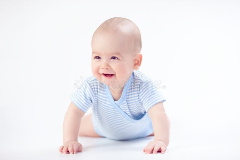 Lächelnbaby im Blau stockfotos Lächelnbaby im Blau stockfotos